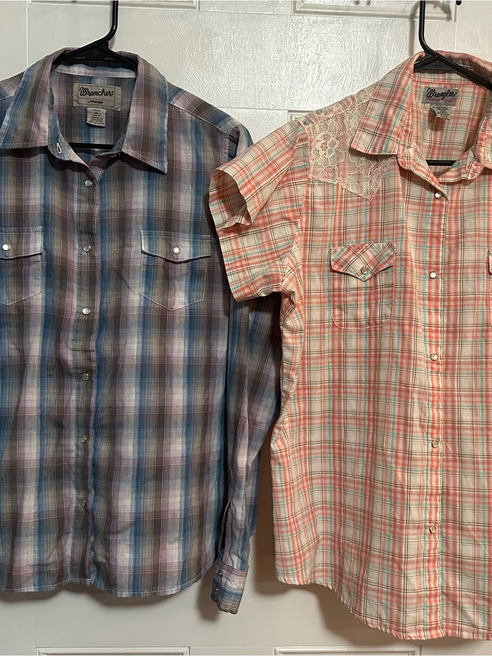 Lot of 2 Wrangler women’s Blue and Pink Plaid Pearl Snap Button-Down Shirts